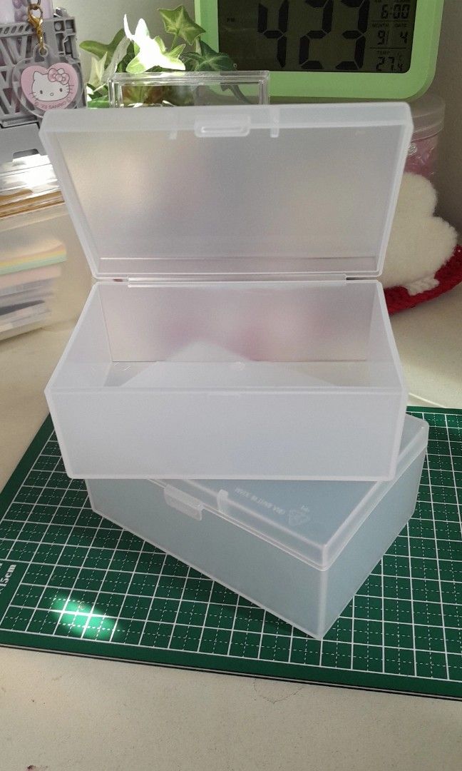 translucent storage boxes (Category: Accessory holder, box & organizers) located in Singapore. Submitted by yeonstarz (Listing ID 1329932783, Image 1). Description: can fit pcs/lomos 10.7 x 7.2 cm.