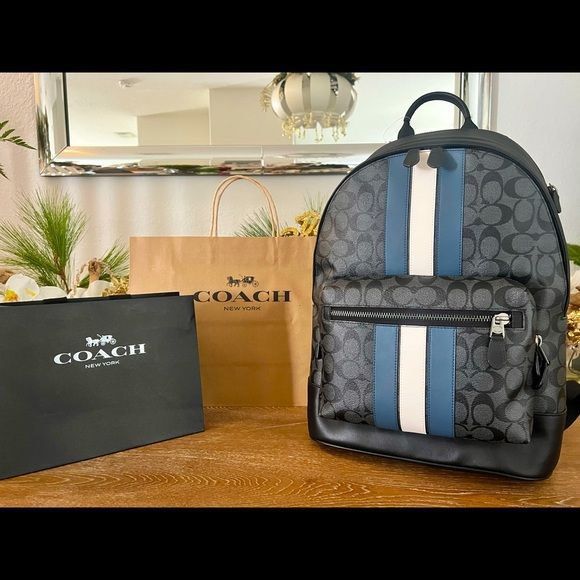 West Backpack In Signature Canvas With Varsity Stripe Men s Fashion Bags Backpacks on Carousell