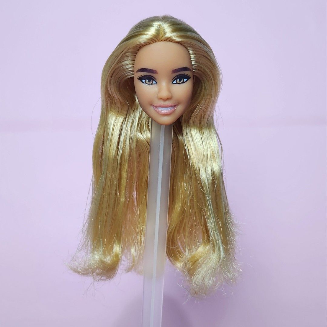 Barbie doll head only no flaws no cut hair Hobbies Toys Toys Games on Carousell