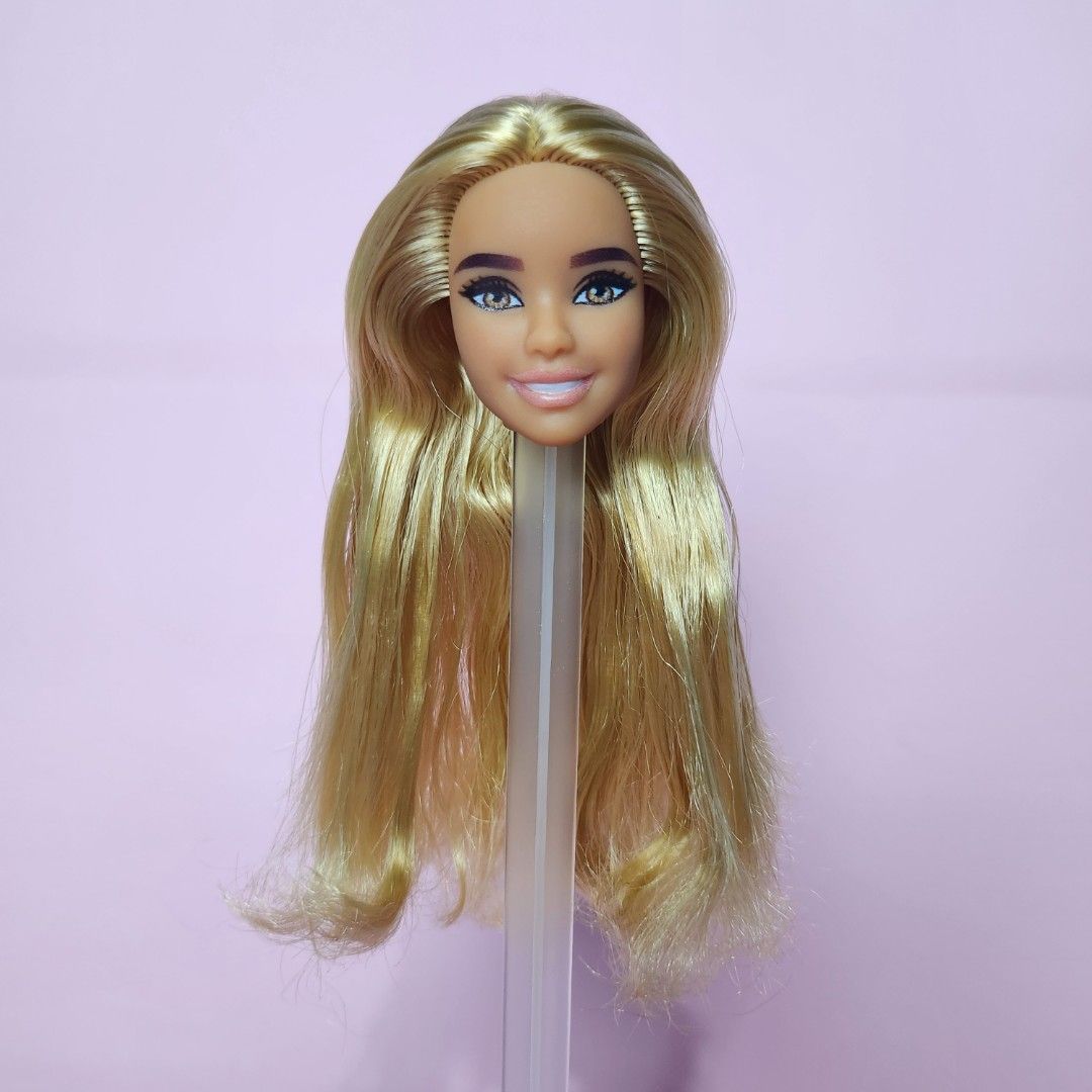 Barbie doll head only no flaws no cut hair Hobbies Toys Toys Games on Carousell