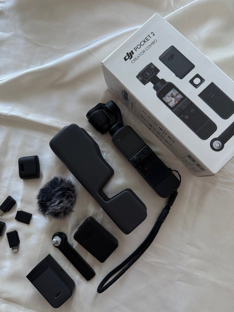 DJI Osmo Pocket 2 Creator Combo (Category: Video Cameras) located in Pasig City. Submitted by nickiscloset (Listing ID 1333910294, Image 2). Description: Purchased in 2023 @ Henry’s Camera Store Good as new ❤️ RFS: Upgrading .