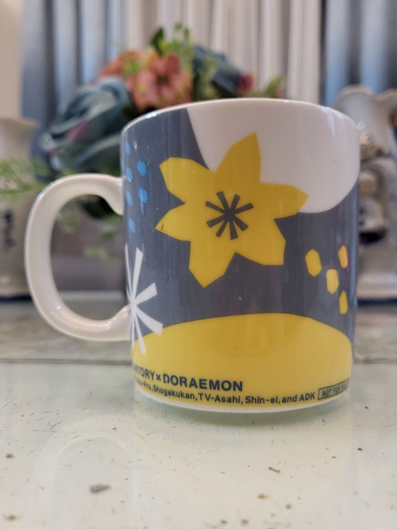 Doraemon × Suntory Blue Floral NFS Mug (Category: Coffee & Tea Tableware) located in San Fernando. Submitted by jpmarketplace2023 (Listing ID 1333981002, Image 3). Description: 💚 All items are authentic from Japan. 💛 MOP: GCash (❌️ GCash Protect) 🩵 MOD: LBC only (❌️ S. Checkout, COD, COP) 💙 Meet-up: Vista Mall, San Fernando, Pampanga 💜 All items are on-hand. 🧡 First to pay gets the item first. ❤️ Breakable items are packed with care and cau