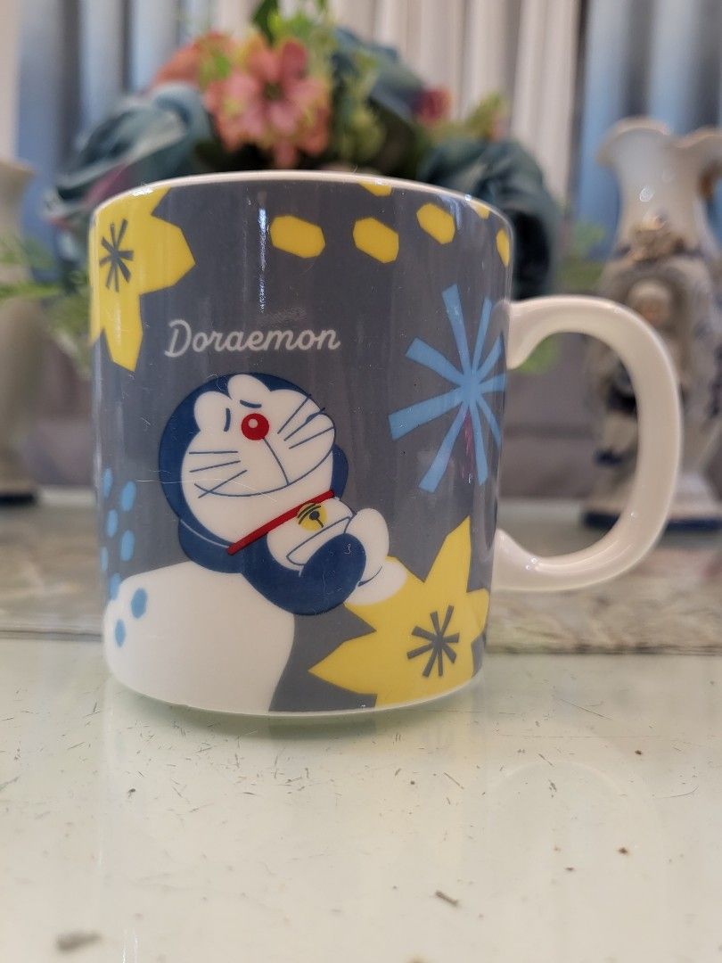 Doraemon × Suntory Blue Floral NFS Mug (Category: Coffee & Tea Tableware) located in San Fernando. Submitted by jpmarketplace2023 (Listing ID 1333981002, Image 1). Description: 💚 All items are authentic from Japan. 💛 MOP: GCash (❌️ GCash Protect) 🩵 MOD: LBC only (❌️ S. Checkout, COD, COP) 💙 Meet-up: Vista Mall, San Fernando, Pampanga 💜 All items are on-hand. 🧡 First to pay gets the item first. ❤️ Breakable items are packed with care and cau
