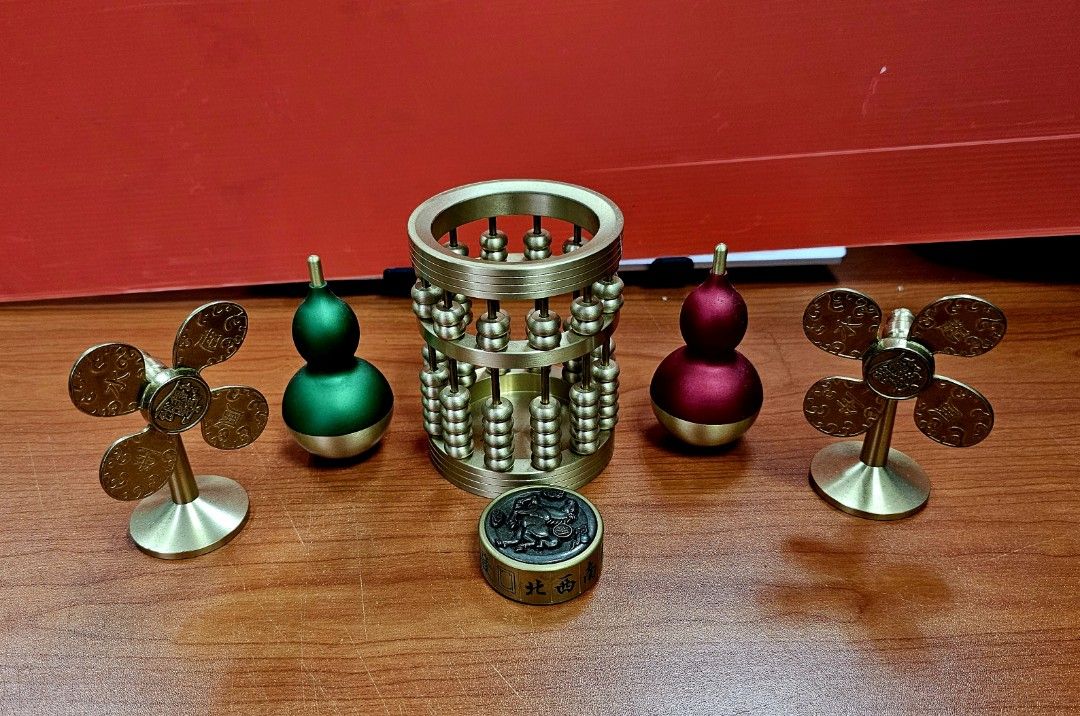 FORTUNE OBJECTS (Category: Vintage Collectibles) located in Singapore. Submitted by owenwongcc (Listing ID 1333970786, Image 2). Description: Unlock Prosperity with Our Fortune Objects. Invite positive energy and prosperity into your life with our exquisite collection of fortune objects. Key Features: - 1 x Bronze Cylinder Abacus - 2 x Bronze Fans - 2 x Bronze Gourds - 1 x Bronze Spinning Cookie. - Variety of Designs. From traditional symbols to 