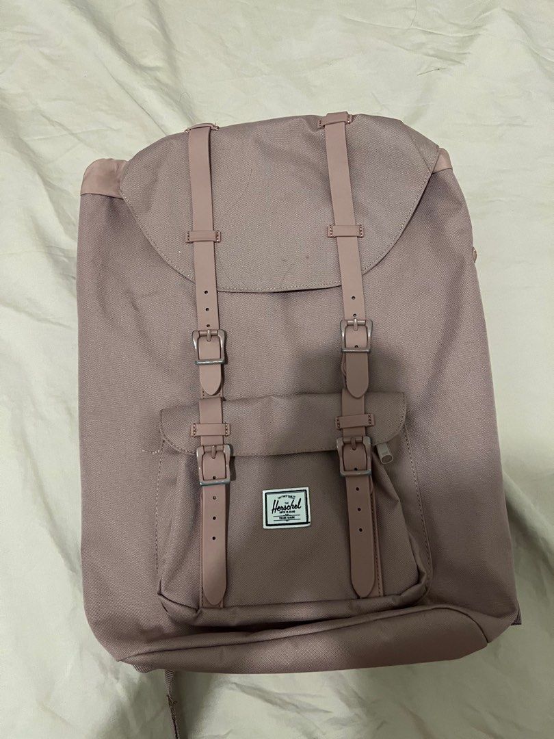 Herschel Little America Ash Rose Backpack (Category: Backpacks) located in Taguig. Submitted by maryeah1234 (Listing ID 1333990432, Image 1). Description: please contact me via SMS sign of usage on buckles area only (faded) retails at 8490php ash rose color is sold out in most branches bought in Uptown Mall branch.