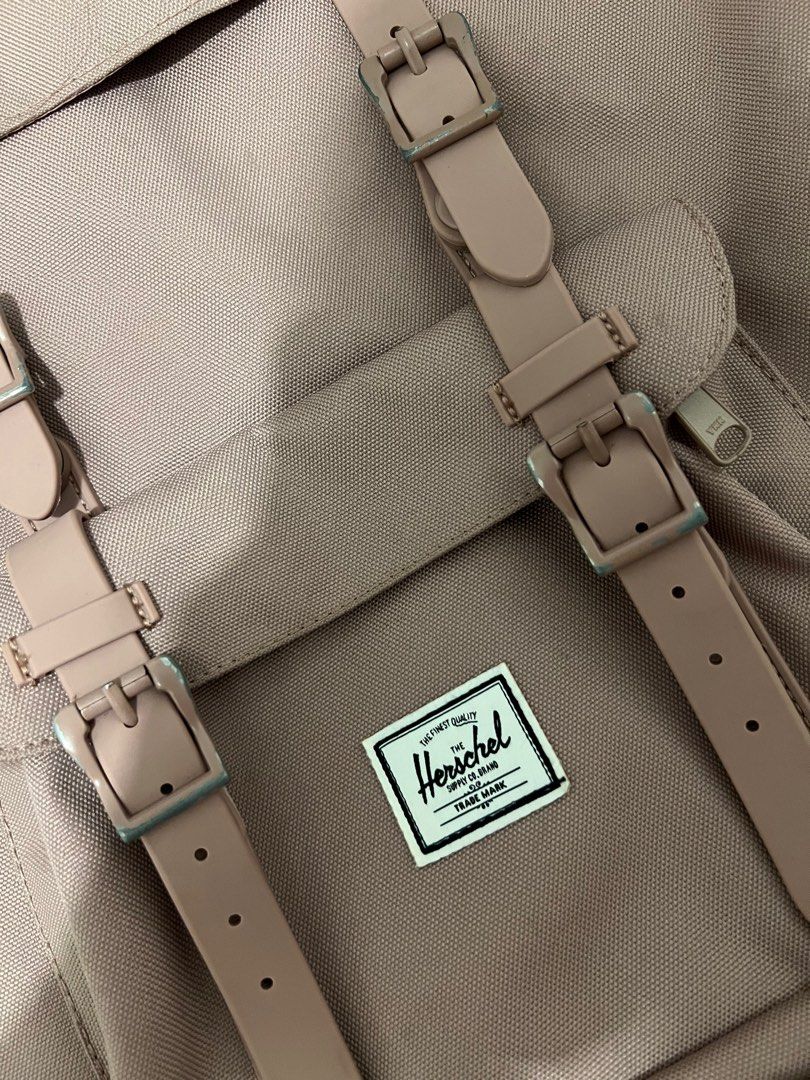 Herschel Little America Ash Rose Backpack (Category: Backpacks) located in Taguig. Submitted by maryeah1234 (Listing ID 1333990432, Image 2). Description: please contact me via SMS sign of usage on buckles area only (faded) retails at 8490php ash rose color is sold out in most branches bought in Uptown Mall branch.