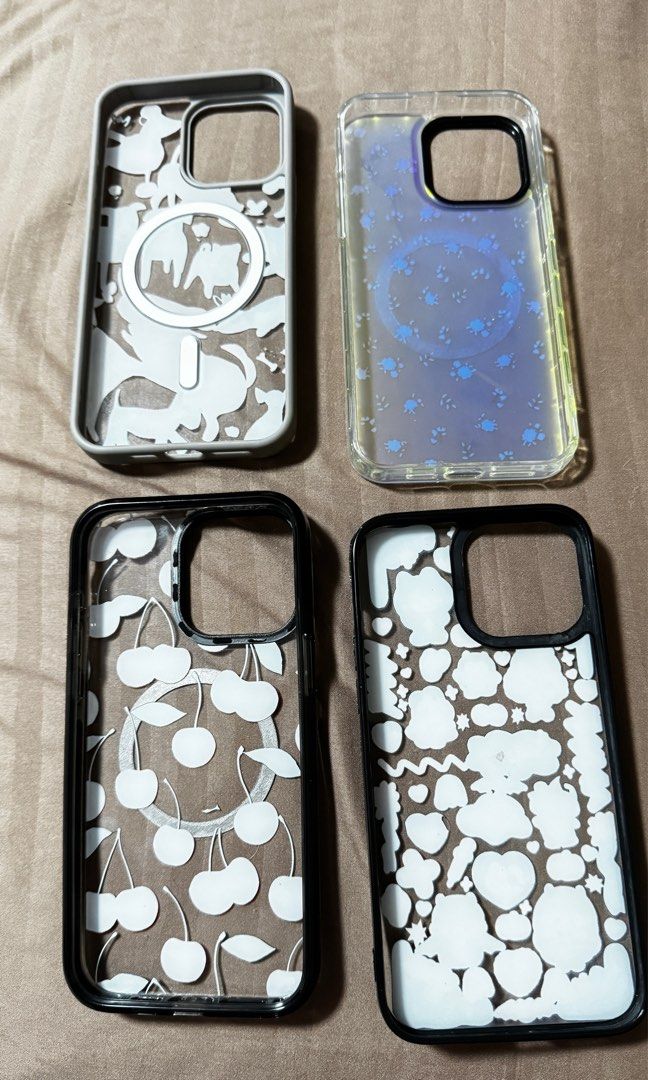 iPhone 15 Pro Max cases (Category: Cases & Sleeves) located in Quezon City. Submitted by kmaeb (Listing ID 1333972433, Image 2). Description: Casetify inspired only Take all for 550 pesos Cherry case- 200 pesos Halloween case- 150 pesos Dog case- 150 pesos Floral holographic case- 120 pesos RFS: decluttering.