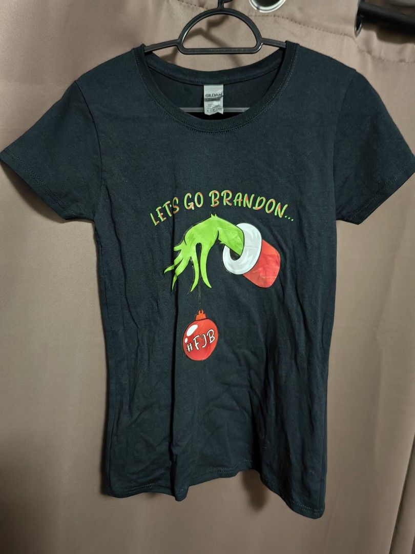 The Grinch Shirt (Category: Shirts) located in Malolos. Submitted by aemcloset (Listing ID 1333969936, Image 1). Description: Can fit up to 36 bust Width 15 Length 24 Cotton stretch.