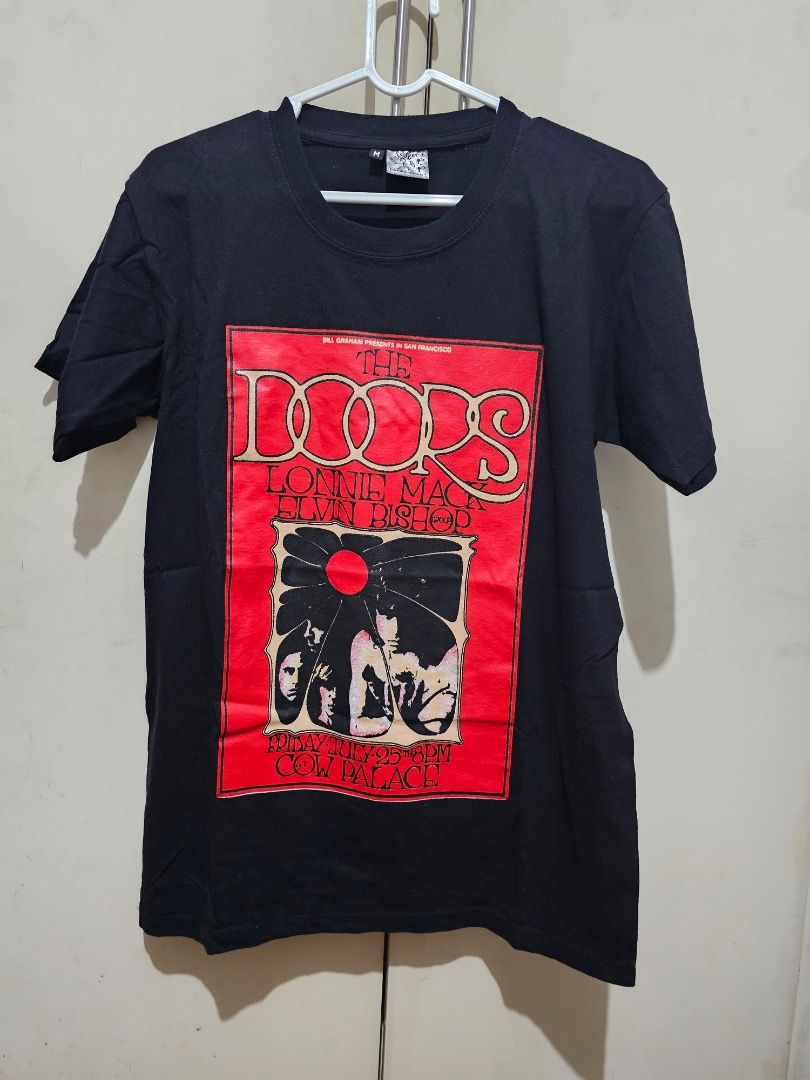 The Doors T-Shirt (Category: Tshirts & Polo Shirts ) located in Quezon City. Submitted by declutteringgalore (Listing ID 1333976380, Image 2). Description: used once print in good condition no cod payment loc: qc shipping at buyer's expense lalamove grab express j&t.
