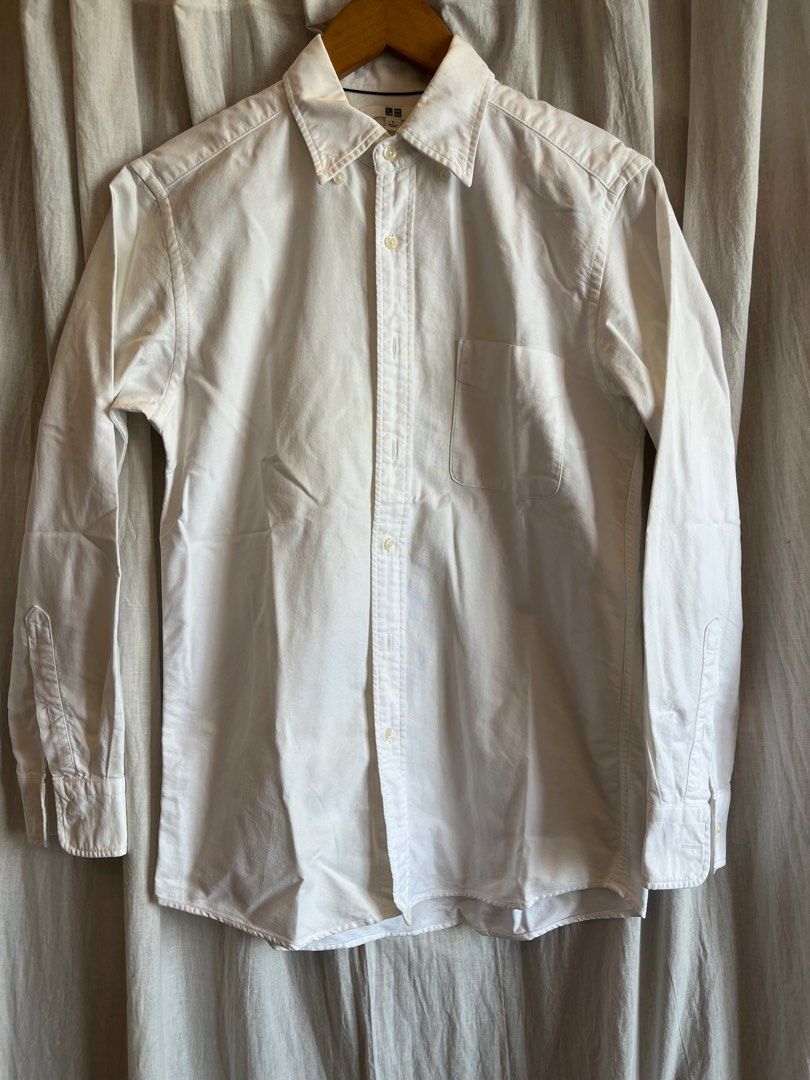 Uniqlo Oxford Longsleeves (Category: Tshirts & Polo Shirts ) located in Pasig City. Submitted by mariatt (Listing ID 1333878746, Image 1). Description: Uniqlo Oxford Long-sleeves Slim fit Stains, but barely noticeable and can be washed Used with care. Please manage expectations. :).