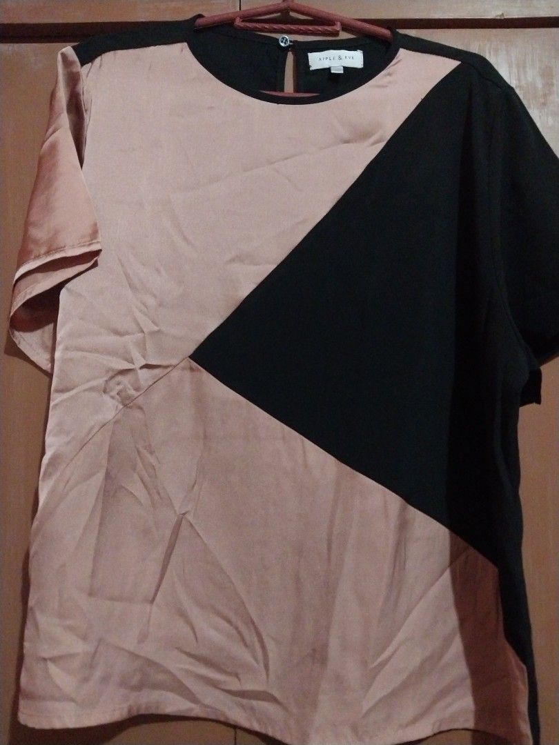 Apple & Eve pre loved blouse 2XL (Category: Blouses) located in Las Pinas. Submitted by declutteringislife (Listing ID 1335434956, Image 1). Description: pre loved blouse like new 2XL rosegold and black satin and cotton bust 44" shoulder 15.5" length 22" armhole 9".