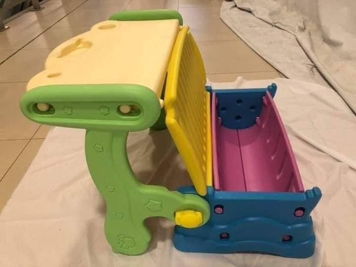 Bisen Study table Multifunctional Table For Kids Table / Chair / Storage / Bench (Category: Kids Tables & Chairs) located in Caloocan City. Submitted by lhaurodi1972 (Listing ID 1335603062, Image 2). Description: 3 in 1 Multi functional Chair/Storage/Study Table Green and Pink PLEASE NOTE THAT THE GREEN ALSO HAVE SOME PINK PARTS ON IT. 3 in 1 Bench/Desk/Storage For Ages 2 to 8 years of age on hand ready for shipping Please read it in detail befor