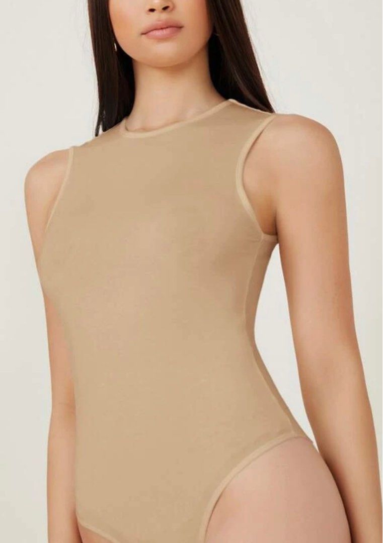 Bodysuit (Category: Blouses) located in Makati City. Submitted by dhaneclutter (Listing ID 1335477805, Image 1). Description: Take all for 550 php, never worn..