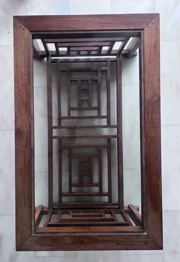 Solid teak Coffee table (Category: Tables & Sets) located in Singapore. Submitted by teamm2 (Listing ID 1335429851, Image 1). Description: Coffee table is made of solid teak wood with beautiful lattice work. Please check pics for imperfections. Table will be cleaned and oiled before delivery. Please arrange delivery at 510779. Thanks. .