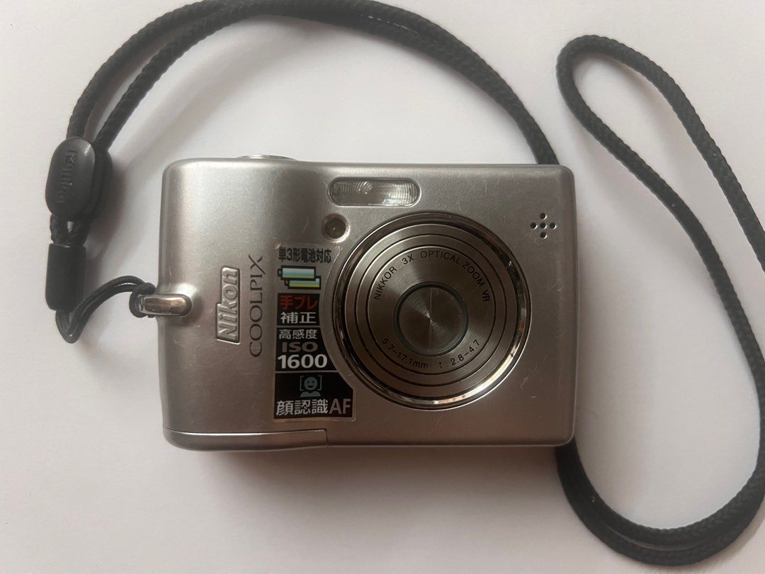 Nikon L12 - FOR REPAIR - DIGICAM (Category: Cameras) located in Manila. Submitted by bwakbwak (Listing ID 1335532464, Image 1). Description: - 2nd hand condition (has few scratches) - FOR REPAIR - kinargahan ng battery tapos di natanggal ng ilang months causing the leak (check 5th photo) - no time to get it repaired myself kayo na lang. NO RETURN & REFUND. BUY AT YOUR OWN RISK! .
