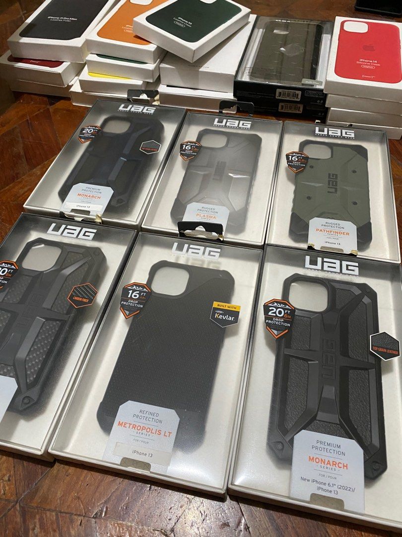 Original UAG Case for iPhone 13 / 14 [Plasma, Pathfinder, Monarch Pro, Metropolis] (Category: Cases & Sleeves) located in Manila. Submitted by razelysonn (Listing ID 1335556436, Image 1). Description: All original 101% with srp at the back a question you may ask again in the conversation Question: Is it original? Answer: It is, 101% ORIGINAL Price list: Plasma Ash - 1200 Pathfinder Green - 1300 Metropolis - 1400 Monarch Pro Leather - 1500 (Black 