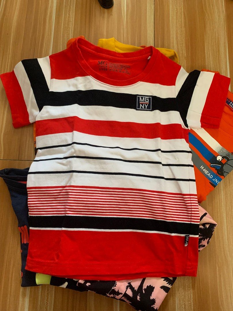 Shirt for kids 3-5 (Category: Babies & Kids Fashion) located in Cauayan City . Submitted by _must_have_ (Listing ID 1335464693, Image 2). Description: Almost brandnew! Not faded. Not manipis. No himulmol. Assorted brand. H&M, Hammerhead, Oshkosh, Starwars, Garfied etc.