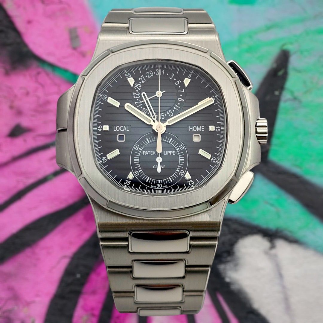 (WTT/WTS) Patek Philippe Nautilus Travel Time Chronograph 5990/1A-011 NOT Aquanaut 5711 5712 5980 5990 RM50 5968 5968 RM055 White Ceramic RM035 Red Nadal and Carbon RM72-01 RM30 RM11 (Category: Watches) located in Singapore. Submitted by alientime.sg (Listing ID 1335583446, Image 1). Description: The blue dial stands out as one of the most distinctive on the market, displaying varying hues under different lighting conditions—a true visual experie
