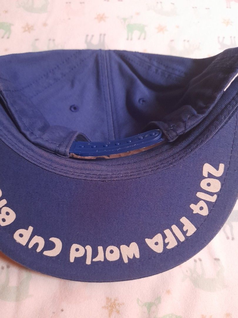 2014 FIFA WORLD CUP - BRAZIL (Category: Caps & Hats) located in San Jose del Monte. Submitted by r33s3 (Listing ID 1335679125, Image 3). Description: 2014 FIFA WORLD CUP - BRAZIL Blue Snapback Complete Snap RFS Deluttering Of My Personal Cap Collection For The Past Years Color Rate 9/10 Color May Vary From Room Lighting Needs Wash And Reshape ***FREE SHIPPING Payment First Policy Feel Free To DM.