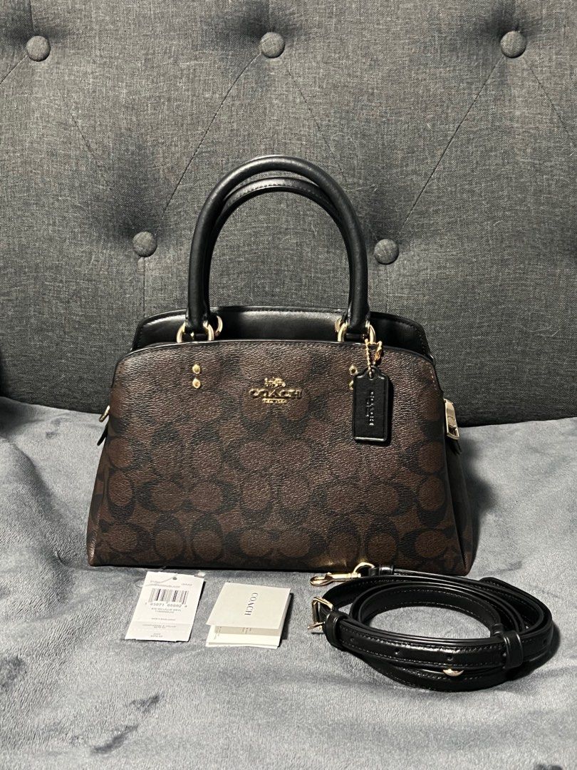 Authentic Coach Mini Lillie Carryall (Category: Luxury Bags & Wallets) located in Tayabas. Submitted by kriskross18 (Listing ID 1335704023, Image 1). Description: I’m selling my Coach bag, which I used only twice. I purchased it for 10,500. Color: Black/Brown It has no flaw. Reason for selling: it’s no longer my style..
