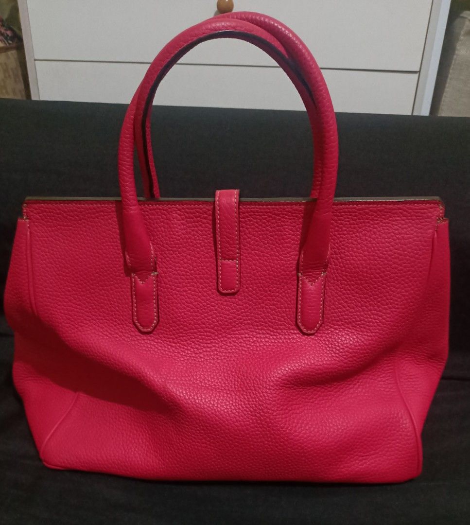 Bruno Magli Pink Classy Hangbag Authentic Leather (Category: Luxury Bags & Wallets) located in Manila. Submitted by rrgdr (Listing ID 1335620753, Image 3). Description: A Bruno Magli handbag in a very nice classy pink color. Authentic leather in material, hardware in gold 98 percent condition. With very minimal signs of use but still very pretty in appearance,very clean inside out, it's pre-loved but definitely well loved..