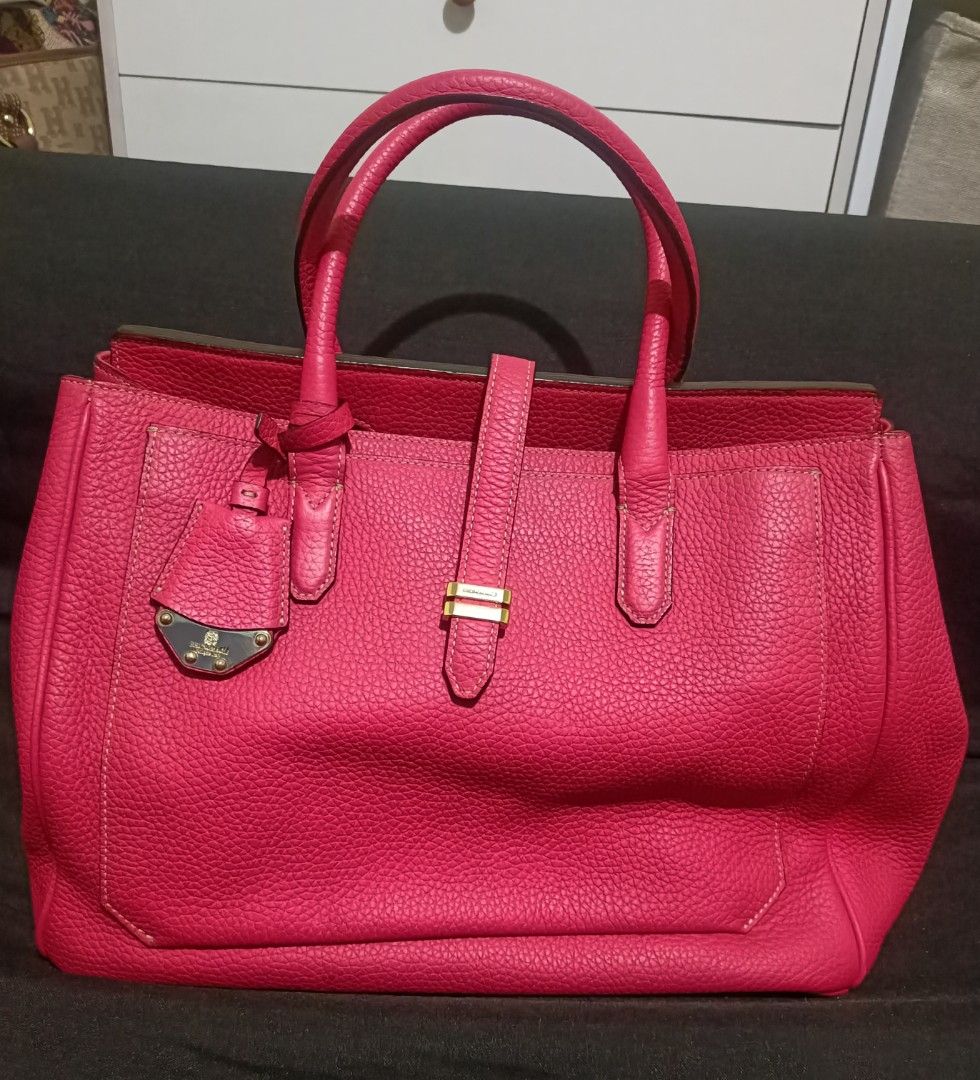 Bruno Magli Pink Classy Hangbag Authentic Leather (Category: Luxury Bags & Wallets) located in Manila. Submitted by rrgdr (Listing ID 1335620753, Image 1). Description: A Bruno Magli handbag in a very nice classy pink color. Authentic leather in material, hardware in gold 98 percent condition. With very minimal signs of use but still very pretty in appearance,very clean inside out, it's pre-loved but definitely well loved..