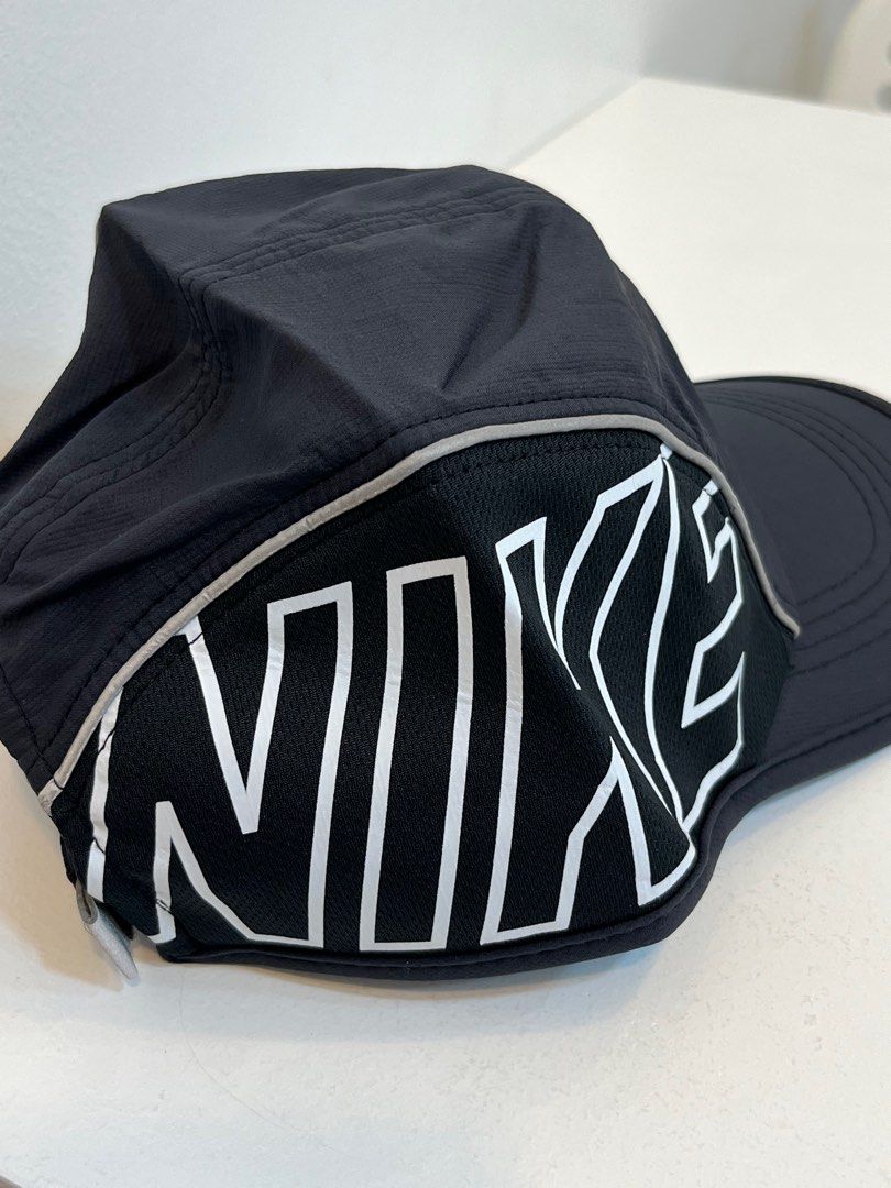 Nike Big side swoosh running cap (Category: Activewear) located in Manila. Submitted by jmdvm (Listing ID 1335712829, Image 2). Description: Osfa Hearing offer as well 📍Sampaloc manila.