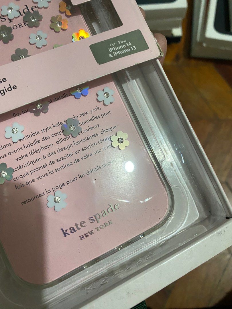 Original Kate Spade Case for iPhone 13 / 14 (Category: Cases & Sleeves) located in Manila. Submitted by razelysonn (Listing ID 1335775315, Image 3). Description: 101% Original, FIXED PRICE BELOW SRP with light at the bottom part as it’s been stored for awhile, minimal issue only.