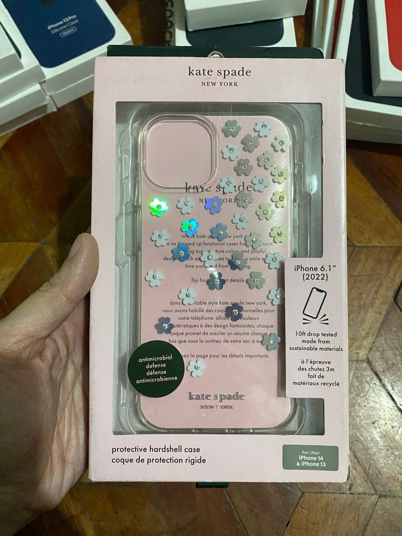 Original Kate Spade Case for iPhone 13 / 14 (Category: Cases & Sleeves) located in Manila. Submitted by razelysonn (Listing ID 1335775315, Image 1). Description: 101% Original, FIXED PRICE BELOW SRP with light at the bottom part as it’s been stored for awhile, minimal issue only.