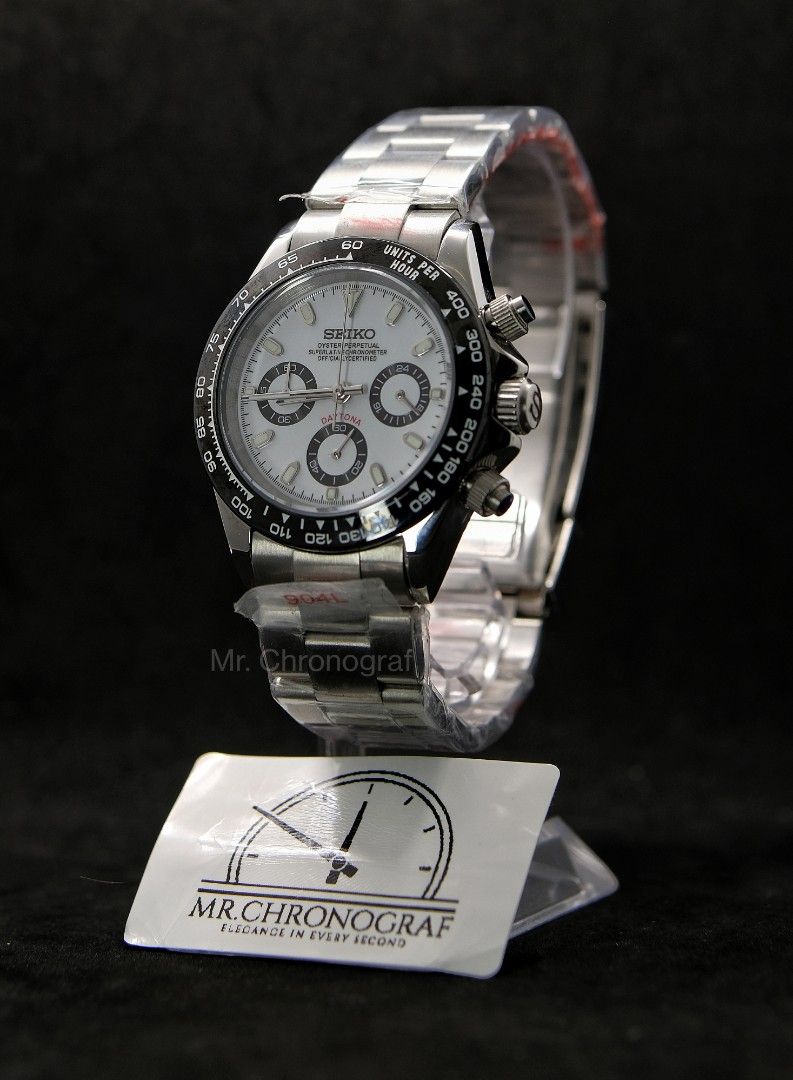 Seiko Mod Daytona Panda (Category: Luxury Watches) located in Manila. Submitted by rafael_lesaguis (Listing ID 1335753881, Image 3). Description: BRANDNEW! Seiko Mod Daytona Panda on Oyster Strap Movement: Seiko VK63 Mecha-Quartz Chronograph with working subdials Case and Strap: 39mm 904L Stainless Oyster Strap Dial: Seiko logo/Daytona Dial Glass: Sapphire scratch resistant Hands: Daytona Dial Seals and gaskets lubricated Inclusions: Watch, Extra