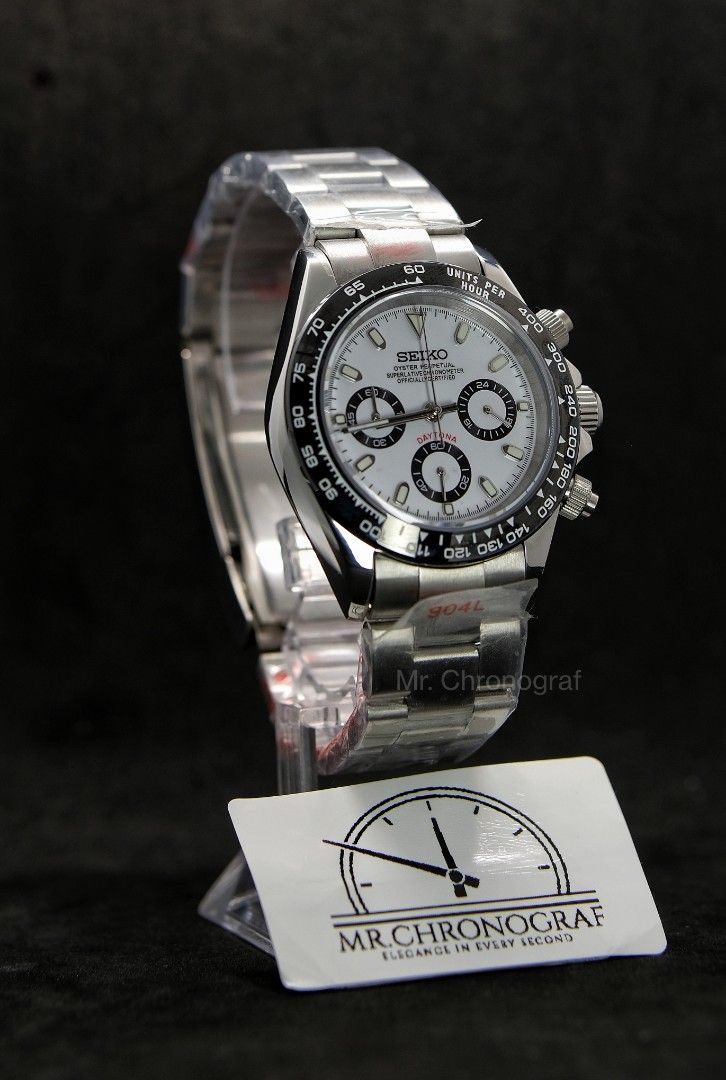 Seiko Mod Daytona Panda (Category: Luxury Watches) located in Manila. Submitted by rafael_lesaguis (Listing ID 1335753881, Image 2). Description: BRANDNEW! Seiko Mod Daytona Panda on Oyster Strap Movement: Seiko VK63 Mecha-Quartz Chronograph with working subdials Case and Strap: 39mm 904L Stainless Oyster Strap Dial: Seiko logo/Daytona Dial Glass: Sapphire scratch resistant Hands: Daytona Dial Seals and gaskets lubricated Inclusions: Watch, Extra