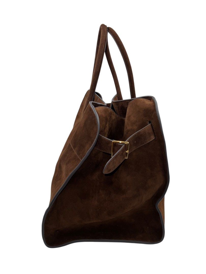 ⚜️The Row 17 - Mocha Suede bag (Category: Luxury Bags & Wallets) located in Makati City. Submitted by 90sangel (Listing ID 1335765042, Image 3). Description: •Item: The Row 17 - Mocha Suede bag 👜🤎 Your new Birkin... 📈👜 hard to get & find •Size: 17 Large & big •Condition: Brand New Condition *Softly structured top-handle bag in soft suede with belted gusseted side panels and interior toggle closure.👜⚜️ Guaranteed Auhentic- Negotiable..