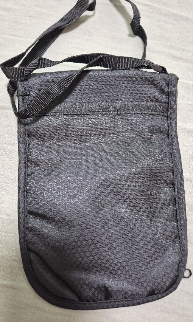 Wanderskye RFID Neck Wallet Accessories (Category: Luxury Bags & Wallets) located in Balagtas. Submitted by GoFundMyTravels (Listing ID 1335764271, Image 3). Description: Wanderskye RFID Neck Wallet Accessories color: black condition: used once RFS decluttering Anti-theft bag to carry items such as cash, cards, and passport. - Provided with RFID-blocking material to keep your information secured. - Perfect for lightweight and worry-free travel. -