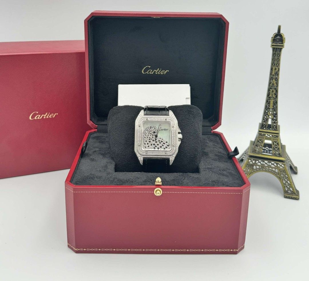 Cartier Santos (Category: Luxury Watches) located in Las Pinas. Submitted by calmphoenix.234114 (Listing ID 1335966245, Image 1). Description: CARTIER SANTOS 100 XL 38MM x 41.3MM REFERENCE 3774 MOTHER OF PEARL (MOP), PANTHÈRE DIAMOND DIAL DIAMOND BEZEL CARTIER BLACK LEATHER STRAP CONDITION 9.8 INCLUSIONS: CARTIER BOX.