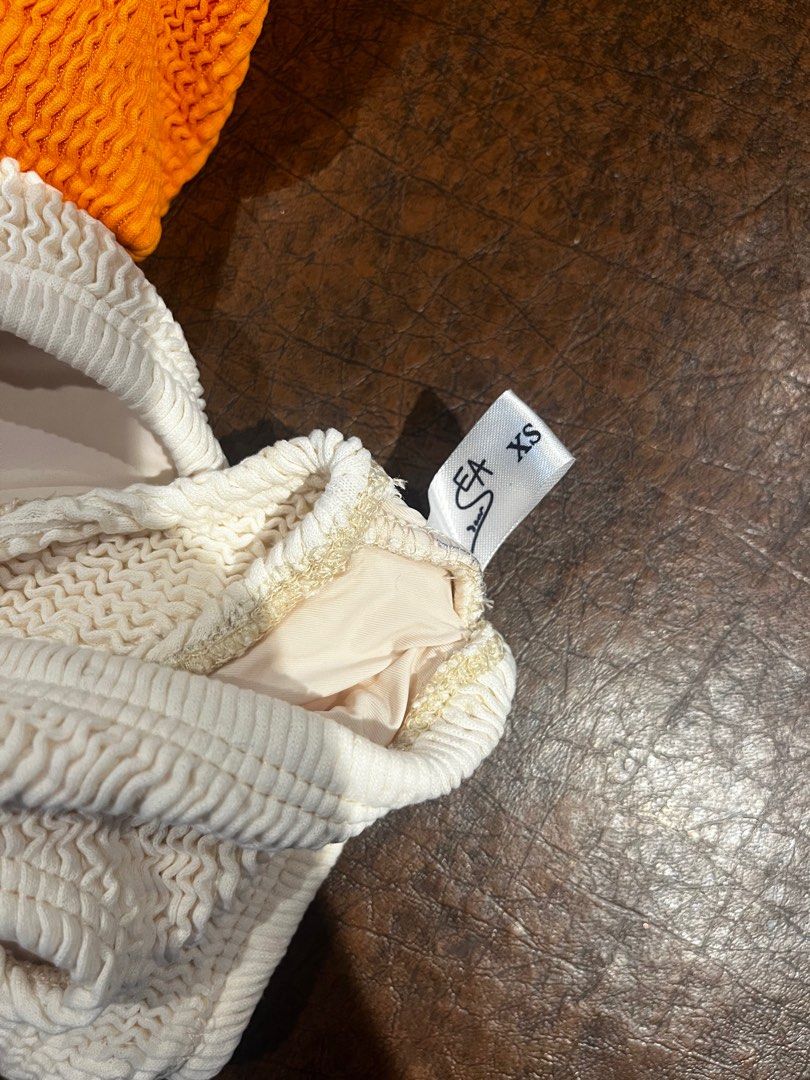 Dear Sea Stories crinkled bikini (Category: Bikinis & Swimsuits) located in Quezon City. Submitted by phantom_reader (Listing ID 1335820755, Image 2). Description: Brand New just stored Still has its sanitary sticker for the bottoms The top is padded Really soft fabric! .