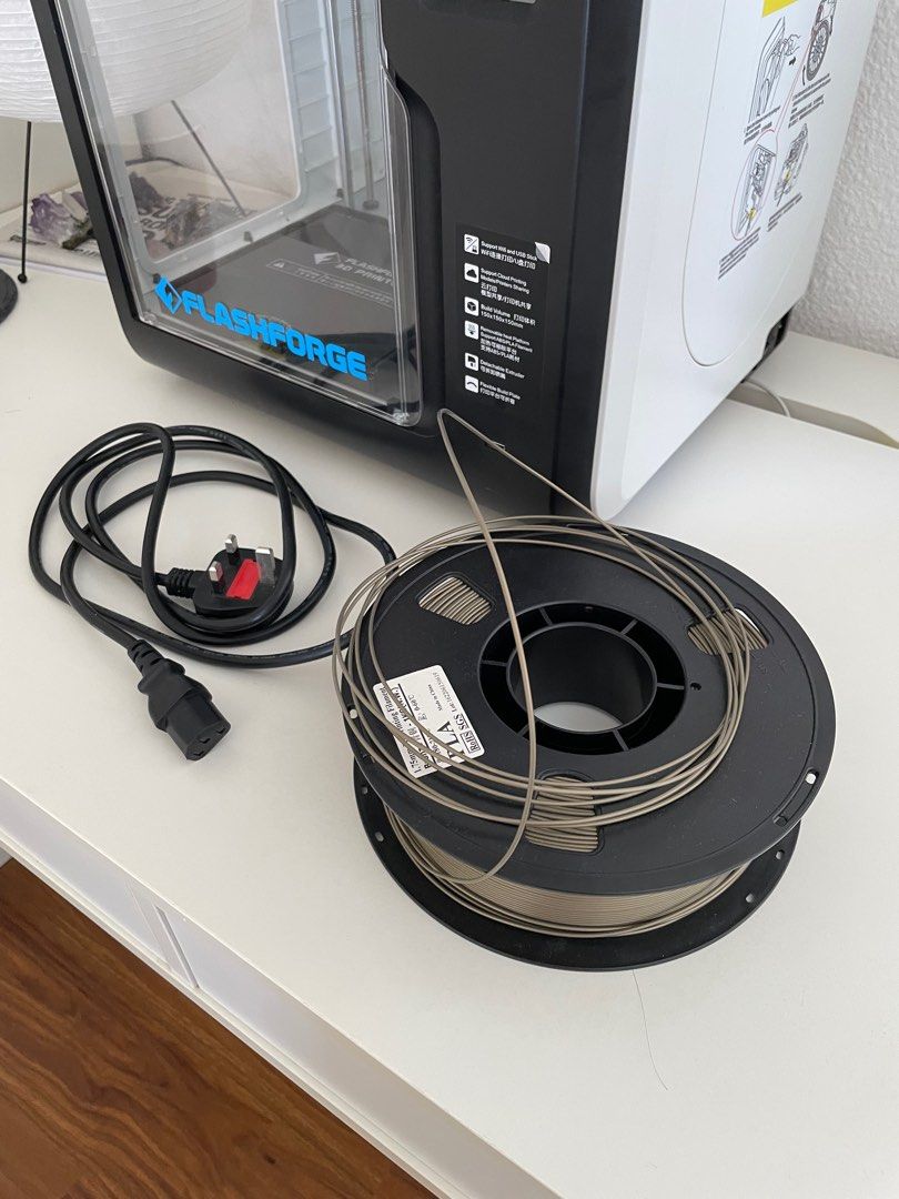 Flashforge 3D Printer (Category: Printers, Scanners & Copiers) located in Singapore. Submitted by treetopavocado (Listing ID 1335794330, Image 3). Description: Lightly used with gold filament ready to use .