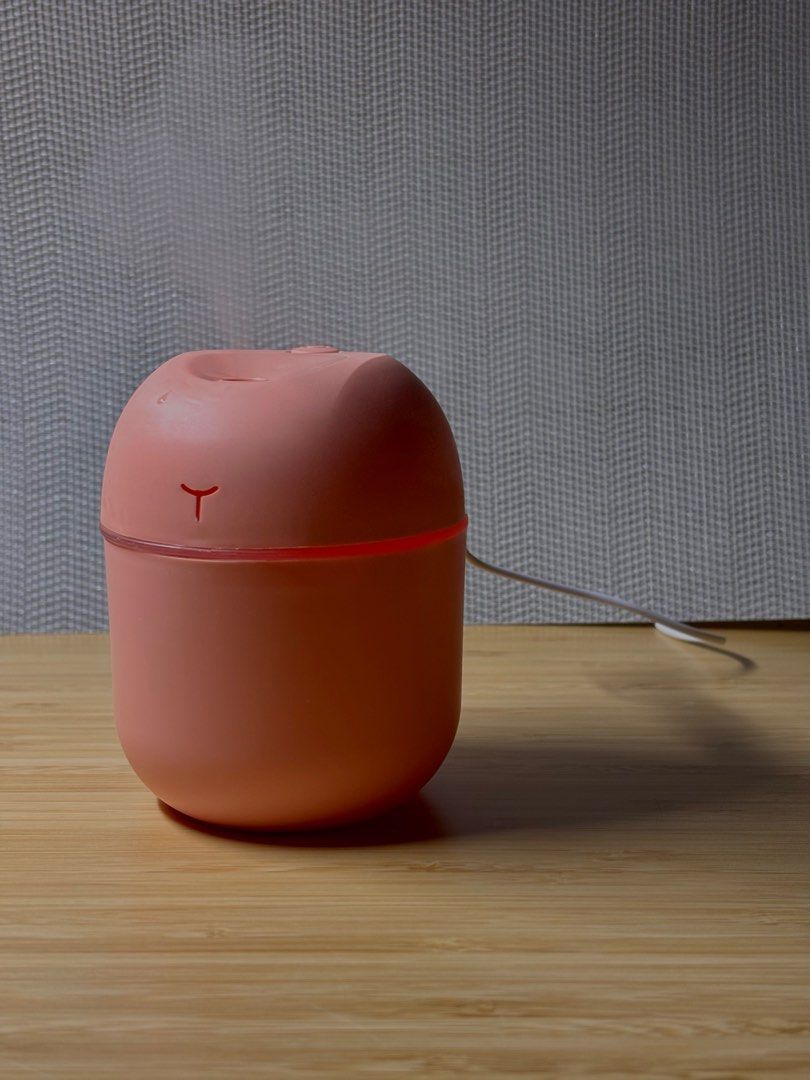 Mist Diffuser (Category: Air Purifiers & Dehumidifiers) located in Singapore. Submitted by ilikeemoney (Listing ID 1335953578, Image 6). Description: Portable 220ml desktop humidifier Charging cable: Mini USB Colours: White, Pink READ BEFORE PURCHASE: The manufacturer and distributor are not liable for any damages, injuries, or losses resulting from misuse, improper installation, or maintenance of this product. By using this product, you assume a