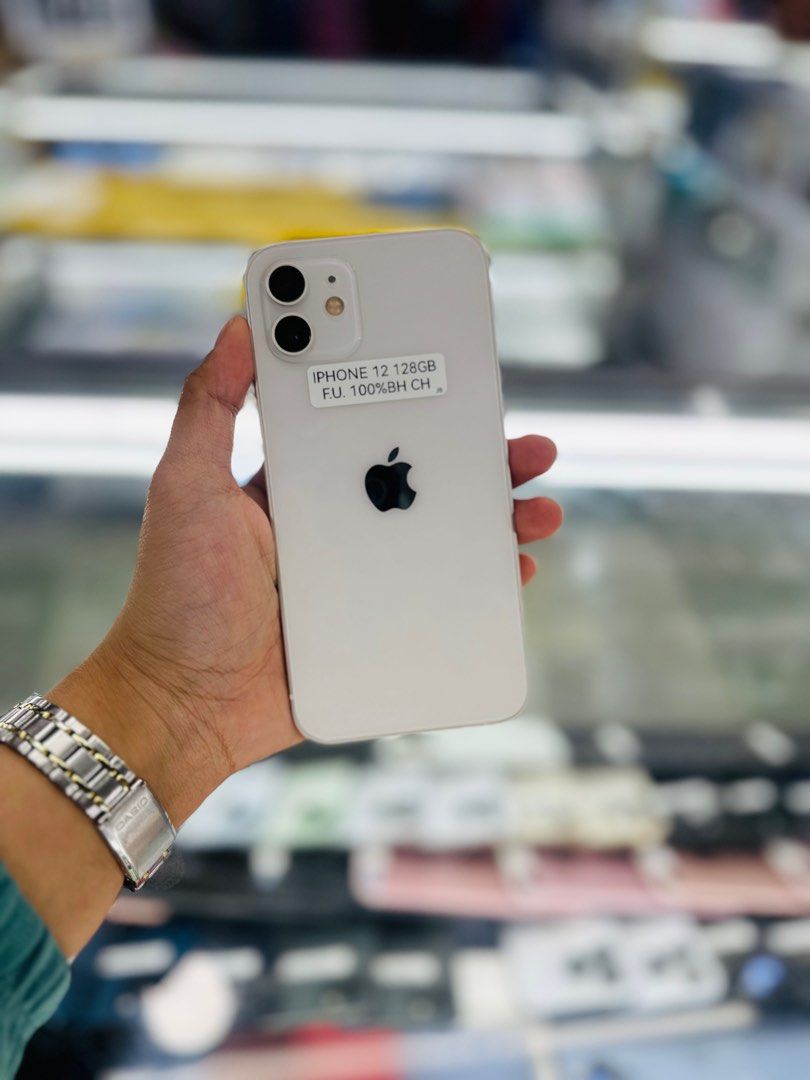 iPhone 12 128gb 100%bh FU Openline Dual CH Variant (Category: iPhone 12 Series) located in San Juan City. Submitted by ainahgadgetsshop (Listing ID 1335897149, Image 1). Description: FOR SALE | TRADE / SWAP PASS SA MGA SCAMMERS / THIRD PARTY (RFS: Buy and Sell) IPHONE 12 128GB FACTORY UNLOCK / DUAL ⬇️DETAILS⬇️ •128 GB (Other storage is also available) •Openline (Other Variant is still available but price may vary) •White (Other color is also avai