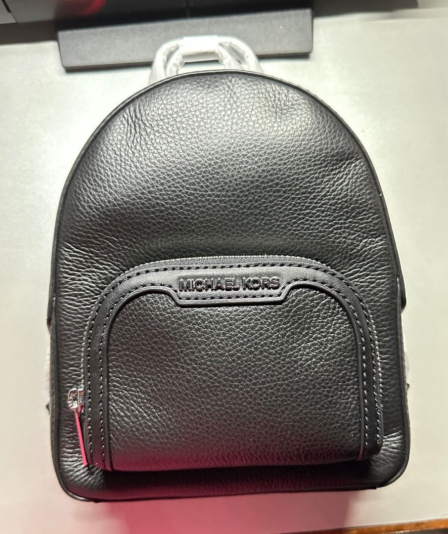MICHAEL KORS JAYCEE Convertible Backpack (Category: Luxury Bags & Wallets) located in Quezon City. Submitted by rouge89 (Listing ID 1335902446, Image 2). Description: MICHAEL KORS JAYCEE Women's Backpack Convertible Zip Pocket Backpack Black Pebbled leather 100% leather Lining: 100% polyester Silver-tone hardware Exterior details: front zip pocket Interior details: back zip pocket, tech compartment, front slip pocket Zip fastening Length-adjustab