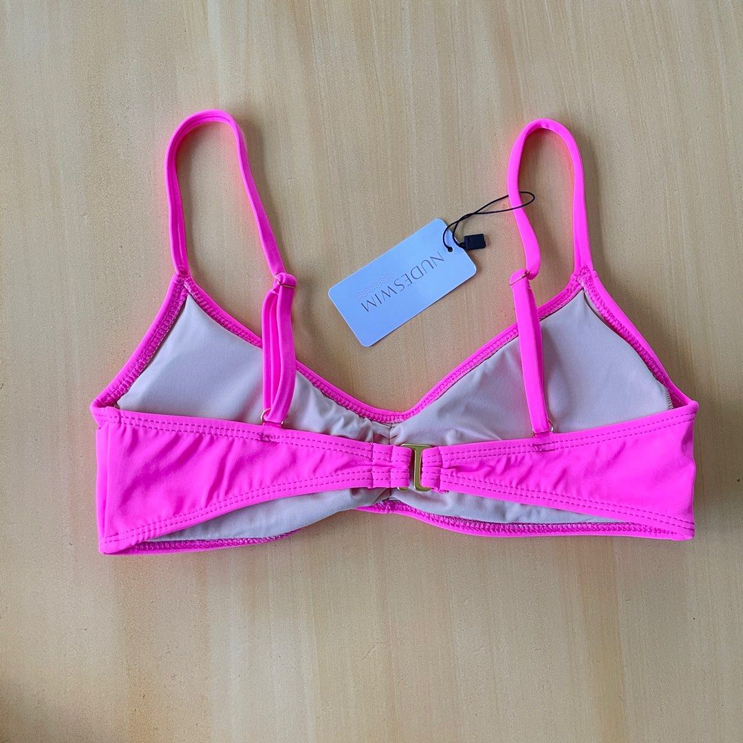 NUDESWIM Pink Swimsuit Top (Category: Bikinis & Swimsuits) located in Orion. Submitted by alyssamint (Listing ID 1335865151, Image 2). Description: NUDESWIM Swimsuit Top Color Pink With adjustable straps Size S Brand New With Tag.