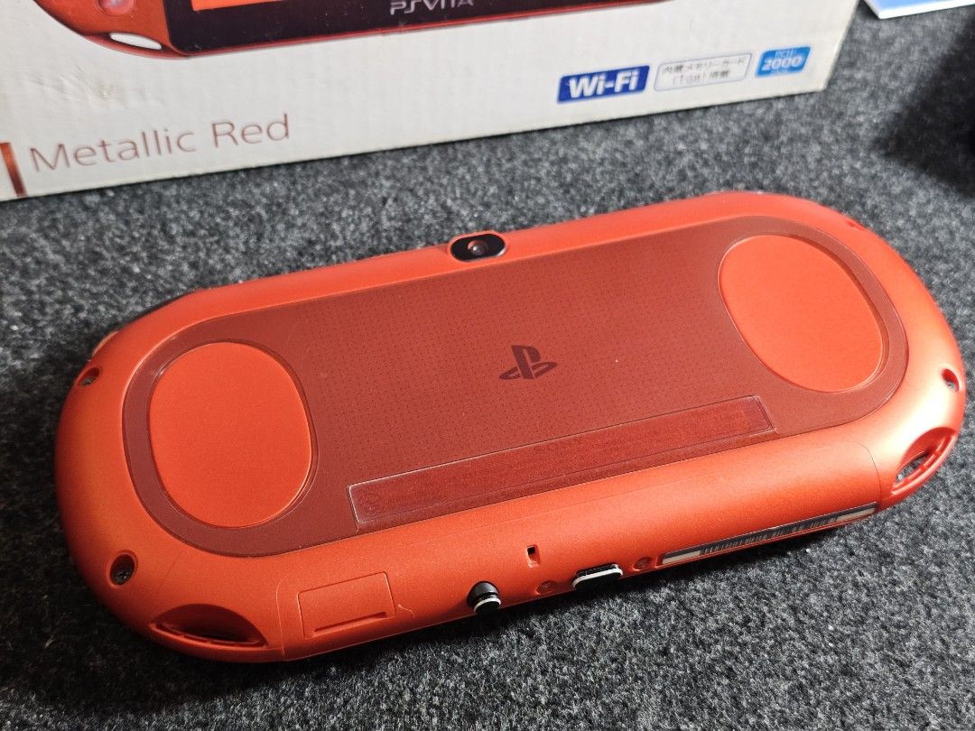 PS Vita Slim Metallic Red (Rare) (Category: PlayStation) located in Paranaque City. Submitted by john020497 (Listing ID 1335821685, Image 3). Description: - Complete with box, manuals, ar cards, charging brick and charging cord. - Around 9.5/10 percent smoothness over all. Screen protected front and back. - With 128gb sd2vita. Parañaque area. Delivery via Lalamove/Grab/LBC..