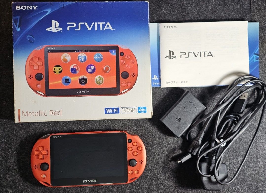 PS Vita Slim Metallic Red (Rare) (Category: PlayStation) located in Paranaque City. Submitted by john020497 (Listing ID 1335821685, Image 1). Description: - Complete with box, manuals, ar cards, charging brick and charging cord. - Around 9.5/10 percent smoothness over all. Screen protected front and back. - With 128gb sd2vita. Parañaque area. Delivery via Lalamove/Grab/LBC..