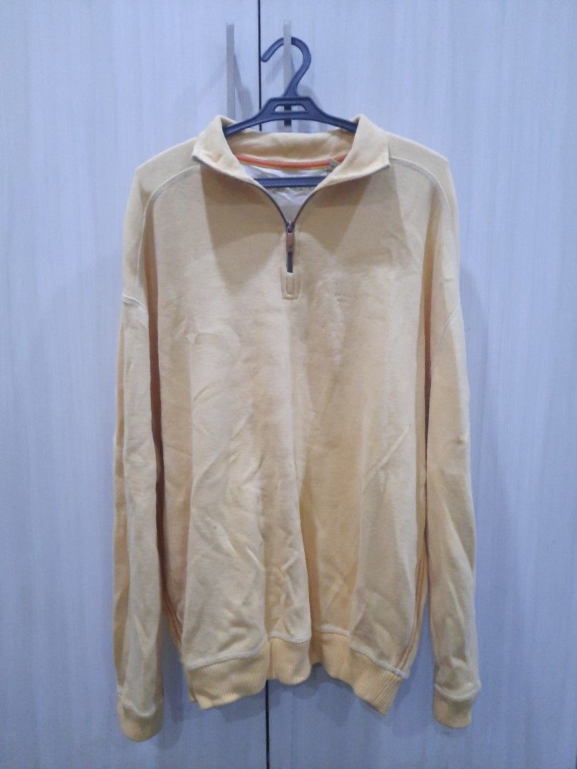Yellow Tommy Bahama quarter zip (Category: Coats, Jackets and Outerwear) located in Marikina City. Submitted by phorts (Listing ID 1335885034, Image 1). Description: L on tag, fits up to XL 30L x 22.5W thick material issues: has some flaws on the collar area, lots of small dirts on the lower part (hasn't been used in a long time).