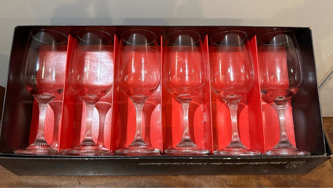 6pc Wine Goblets with Fine Rim (Category: Dinnerware & Cutlery) located in San Juan City. Submitted by atdonmiguel (Listing ID 1336079707, Image 2). Description: 6pc Wine Glass Set with art deco stem dedign by DEMA Serenade. Size : 5.5cm diameter opening x 17.5 cm height All in good condition. Comes in its original box. Never been used. .