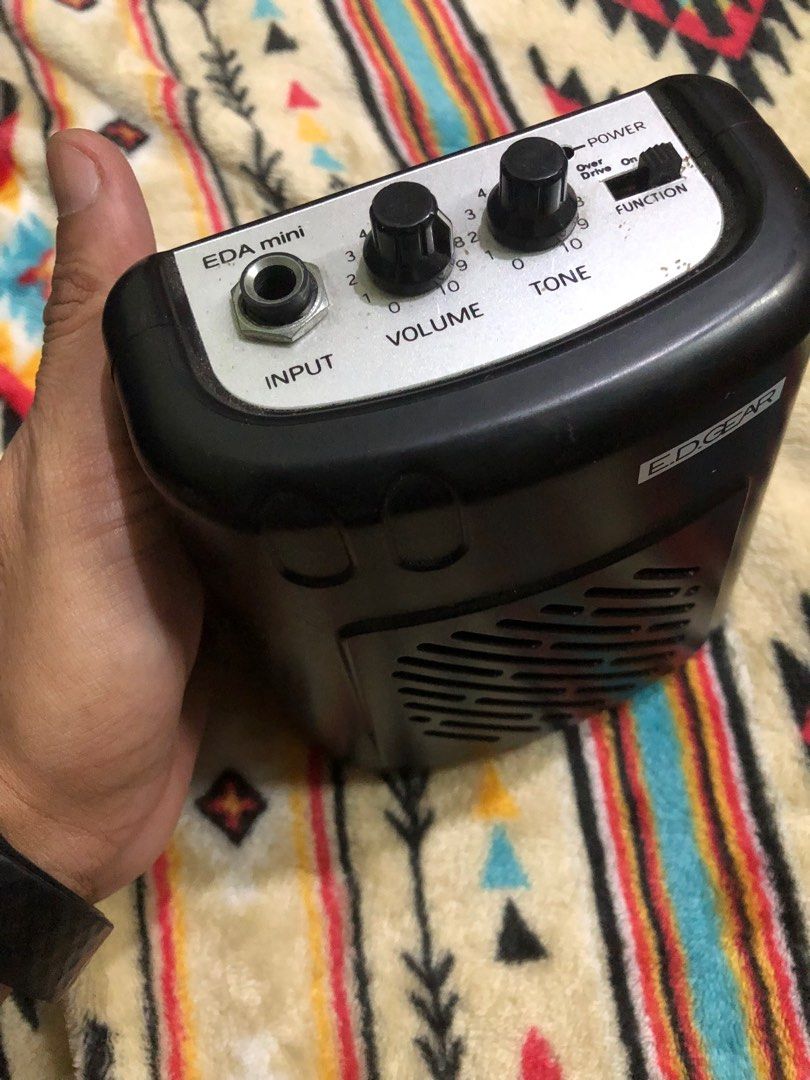ED gear belt clip on mini guitar amplifier (Category: Musical Instruments) located in Quezon City. Submitted by markgolveo (Listing ID 1336004809, Image 2). Description: ED gear belt clip on mini guitar amplifier Tested working good sound output for its size 9v bar size battery operated Can be plugged on its side if you have an adapter for desktop table ise.