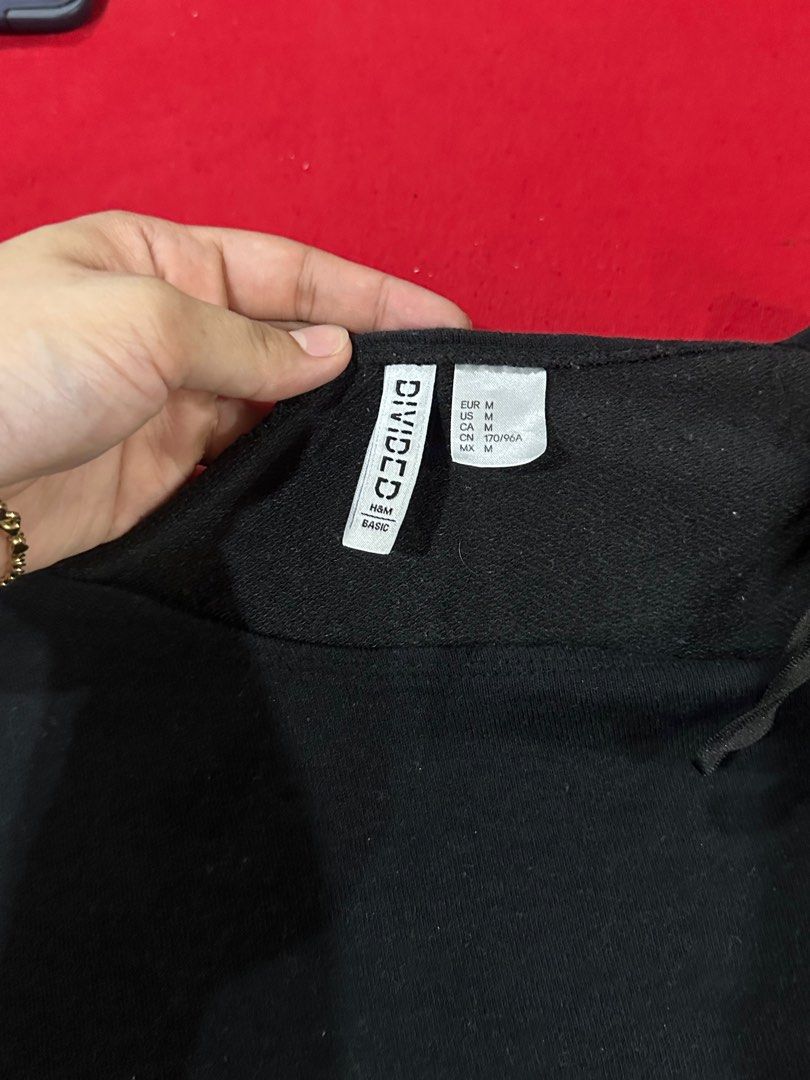 H&M Divided Black sweater (Category: Longsleeves) located in Mandaluyong City. Submitted by thingsrandom (Listing ID 1336007755, Image 2). Description: H&M Divided Black Sweater Medium but can fit Large rfs: Decluttering.