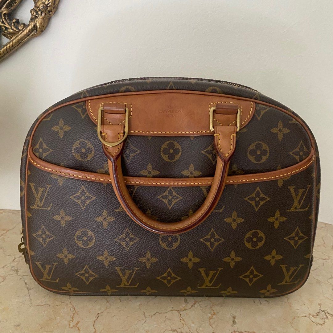 Louis Vuitton Deauville Monogram Bag (Category: Bags & Wallets) located in Singapore. Submitted by mis0x (Listing ID 1336075417, Image 1). Description: Authentic. Comes with original dust bag. Please note the condition is reflected as in pictures, item is in preloved condition, generally in ok condition, but with some light staining and discoloration as shown. Please ask questions to clarify before purchasing..