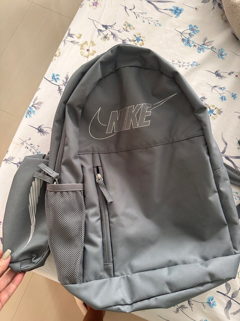 NIKE BACKPACK (Category: Backpacks) located in Singapore. Submitted by mandamanday (Listing ID 1336083067, Image 1). Description: NIKE BACKPACK in grey. Brand new, no tag. .