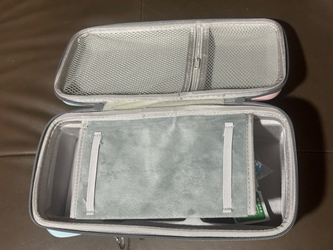 Nintendo Switch Console Casing (Category: Cases & Covers) located in Singapore. Submitted by absolutely12758 (Listing ID 1336042455, Image 2). Description: Nintendo Switch Console Casing! The casing is able to hold the following items: Docking Game console Joycons Charger Game Cartridges .