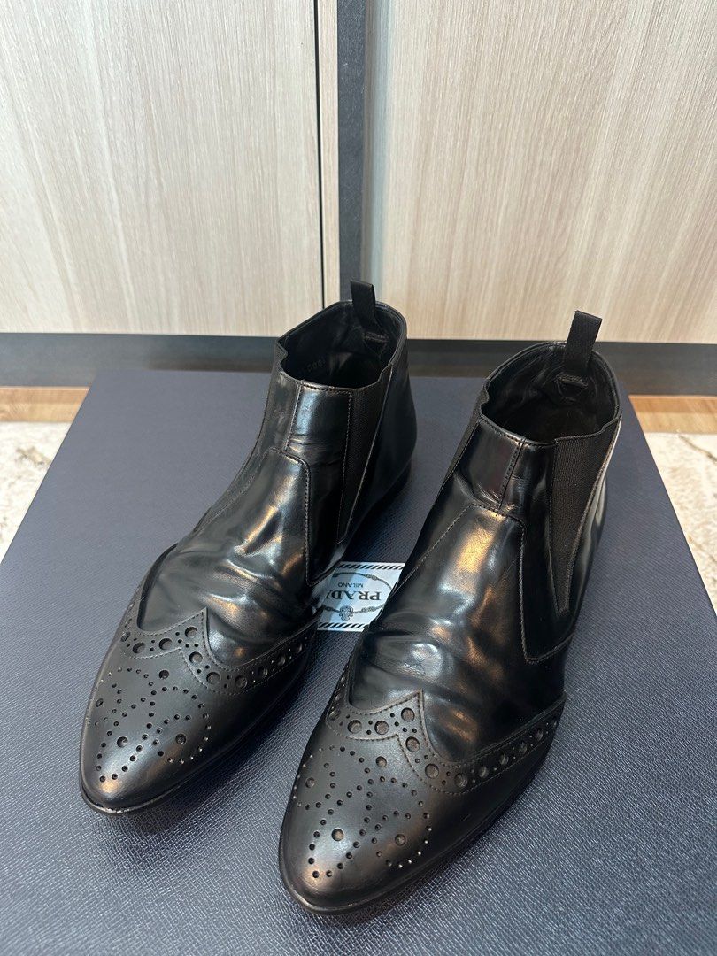 Prada Boot (Category: Dress shoes) located in Kuala Lumpur. Submitted by mr.az92 (Listing ID 1336071084, Image 1). Description: Prada Boot 9uk to let go. Condition masih cun elok. Pakai for winter trip je. Depan sharp jd muat utk 8uk bkn utk 9uk. Tapak pun msih padu elok. Comes with shoes only. Price nego! .
